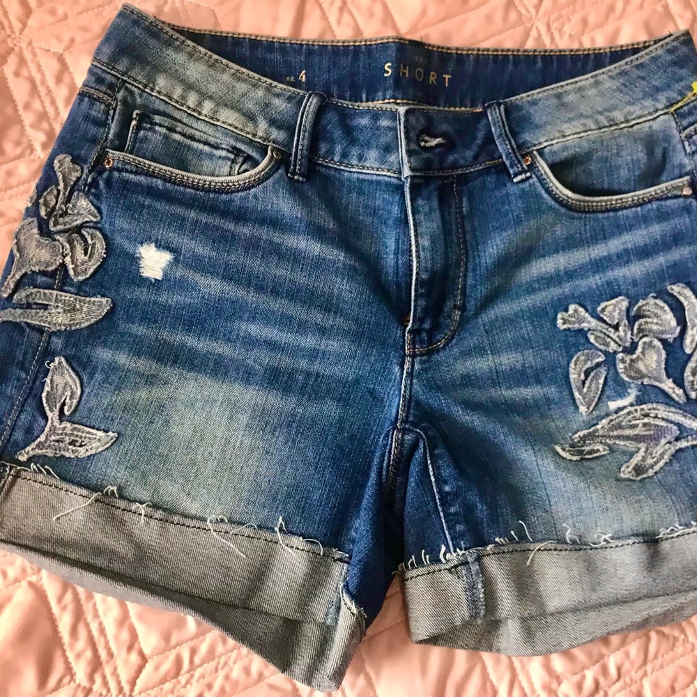 Shorts with cuff. Jean shorts with lace embellishment. Size 4.
